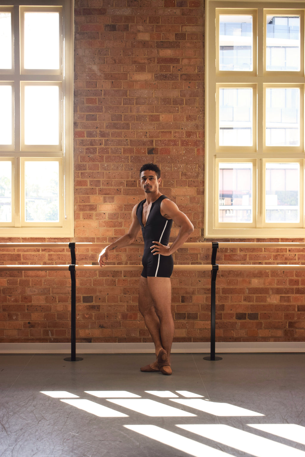 Male dancer wearing Gents EKTO SUIT GT 1.0 in studio