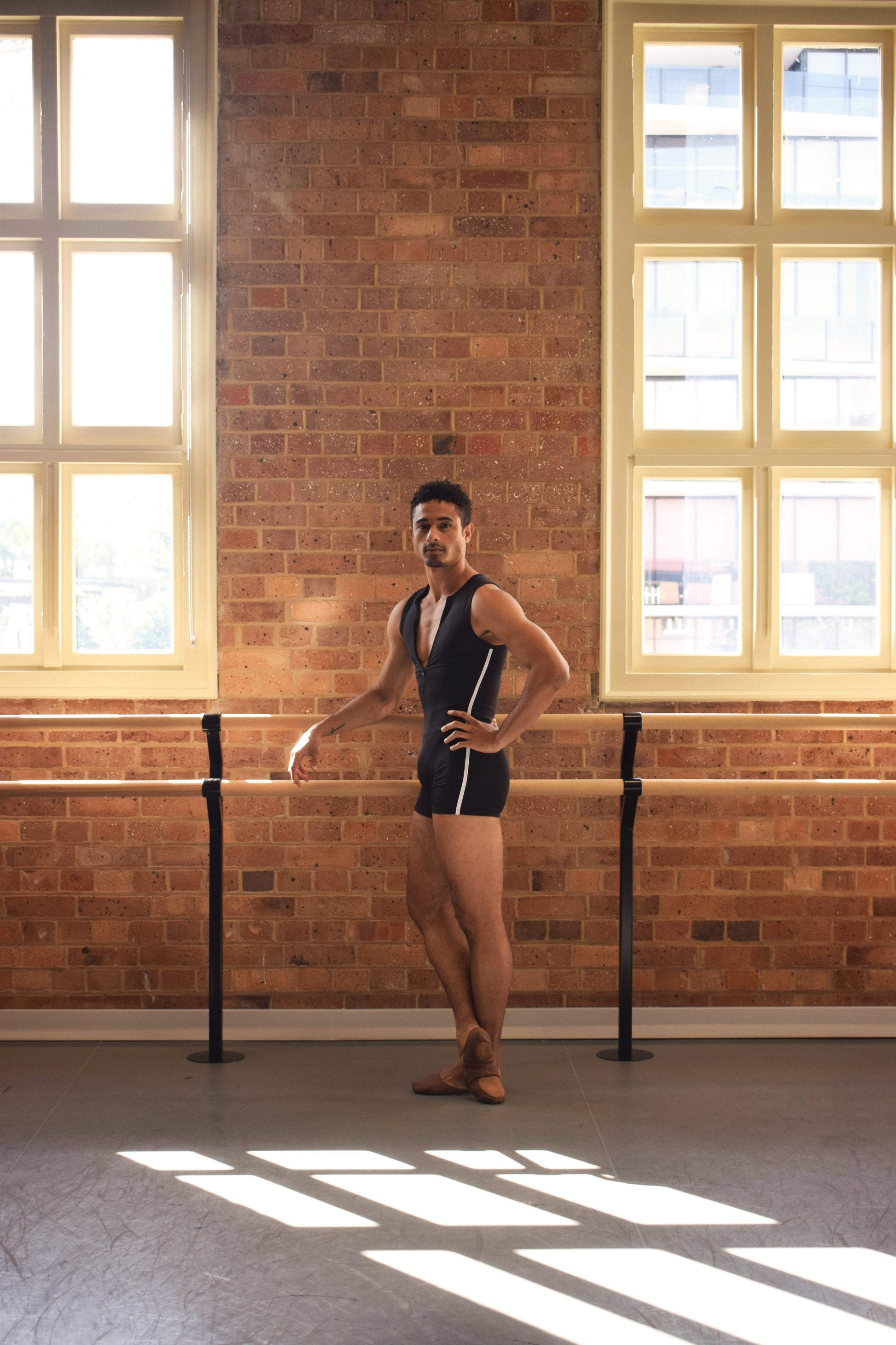 Male dancer wearing Gents EKTO SUIT GT 1.0 in studio