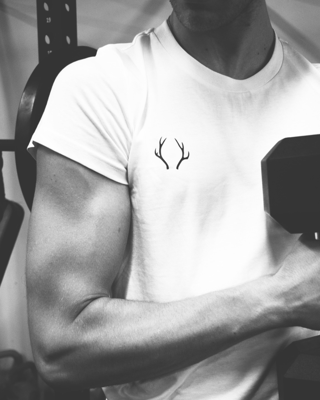 Male dancer wearing white GENTS tee, front view